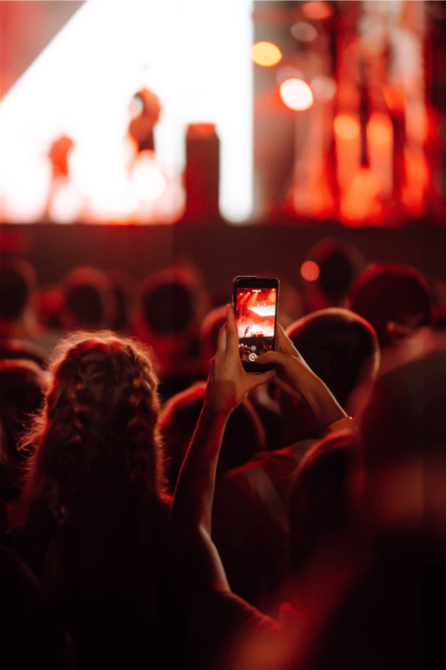 Photographer using HiveMoments to collect guest photos at a live event