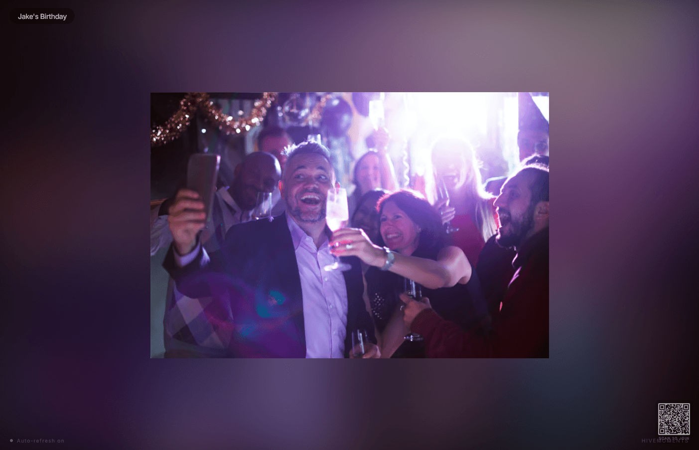 HiveMoments live slideshow playing wedding gallery photos in real time
